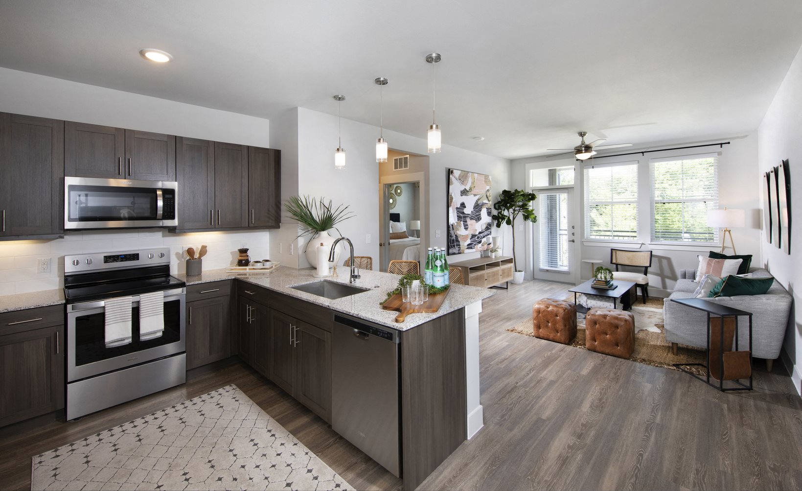 a kitchen with stainless steel appliances,
